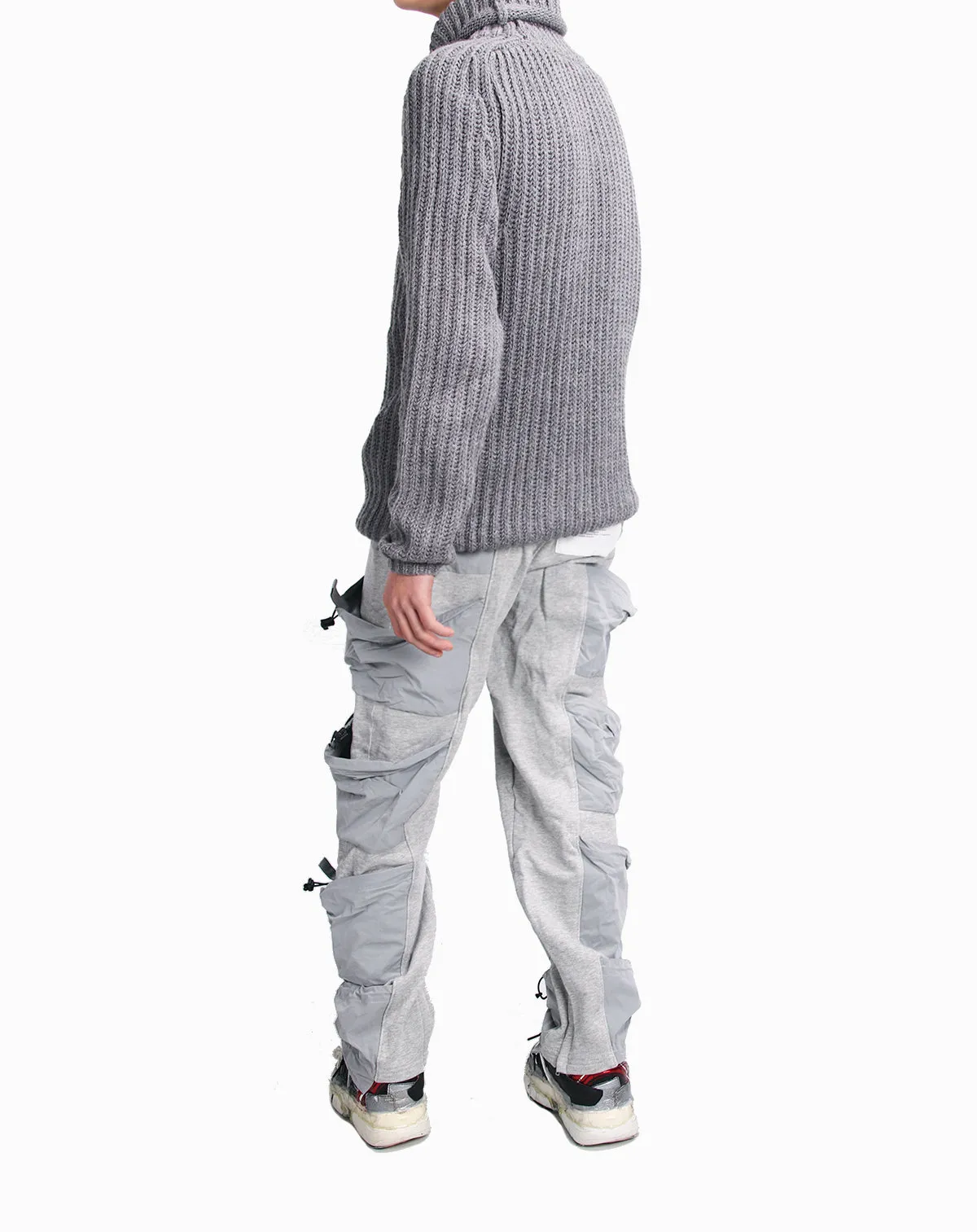 HIGH COLLAR JUMPER IN REFLECTIVE WOOLEN KNIT